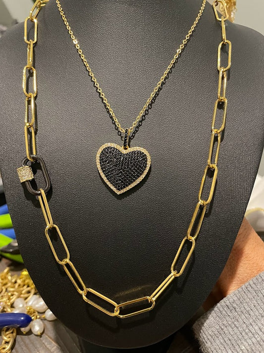 Gold links and carabiner